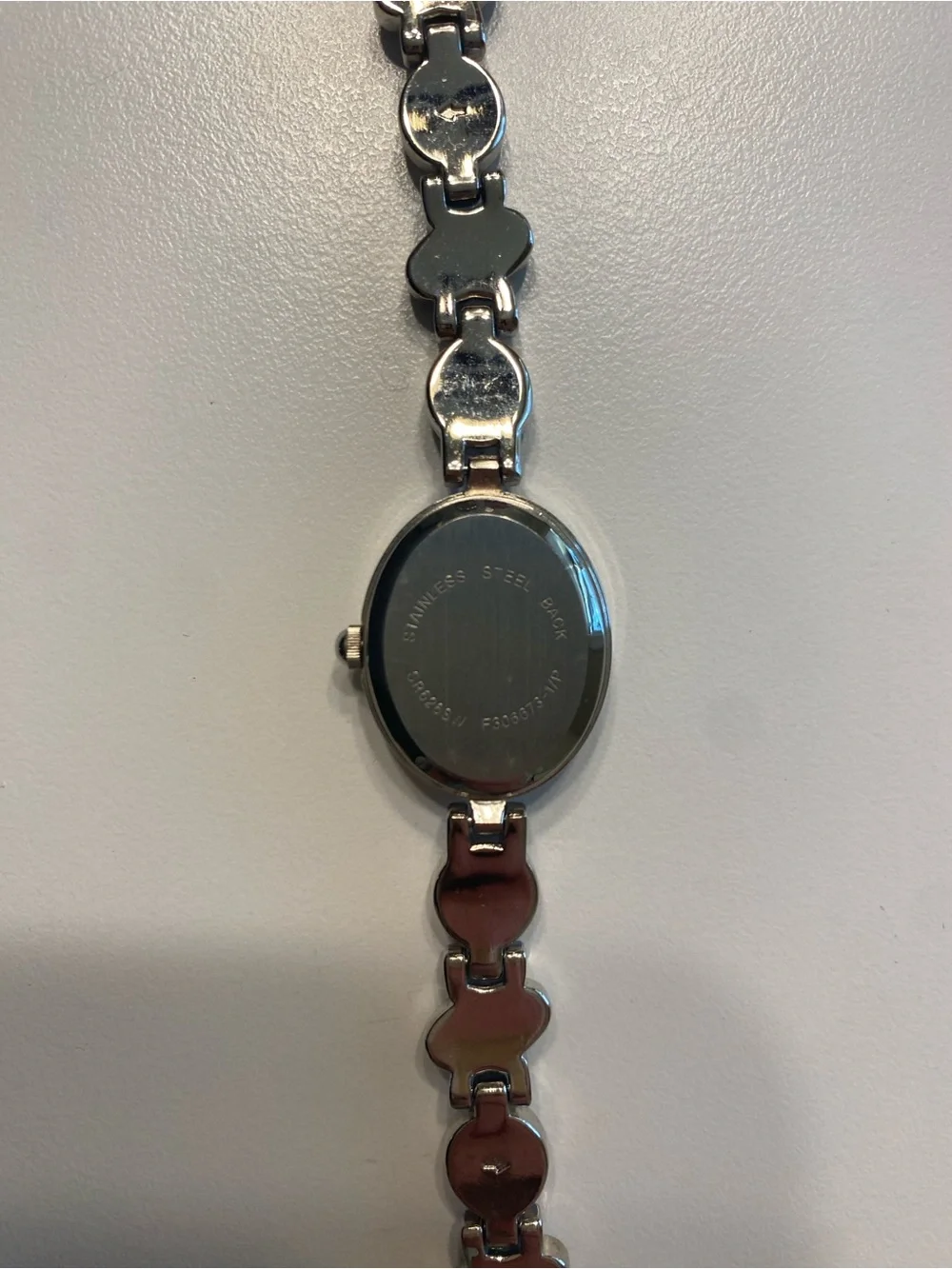 Silver Women's Bracelet Watch with Ruby Stone Accents